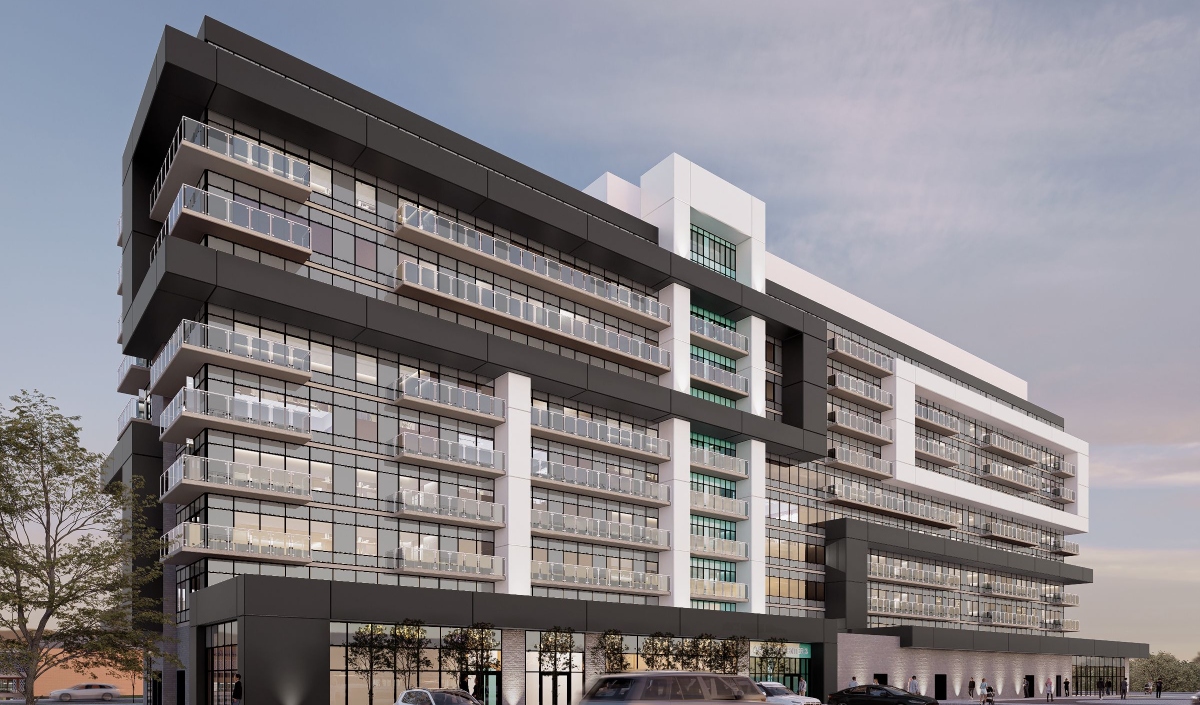 Contemporary multi-story building with glass facades, balconies, and black-and-white geometric exterior design, seen at street level with cars parked below.