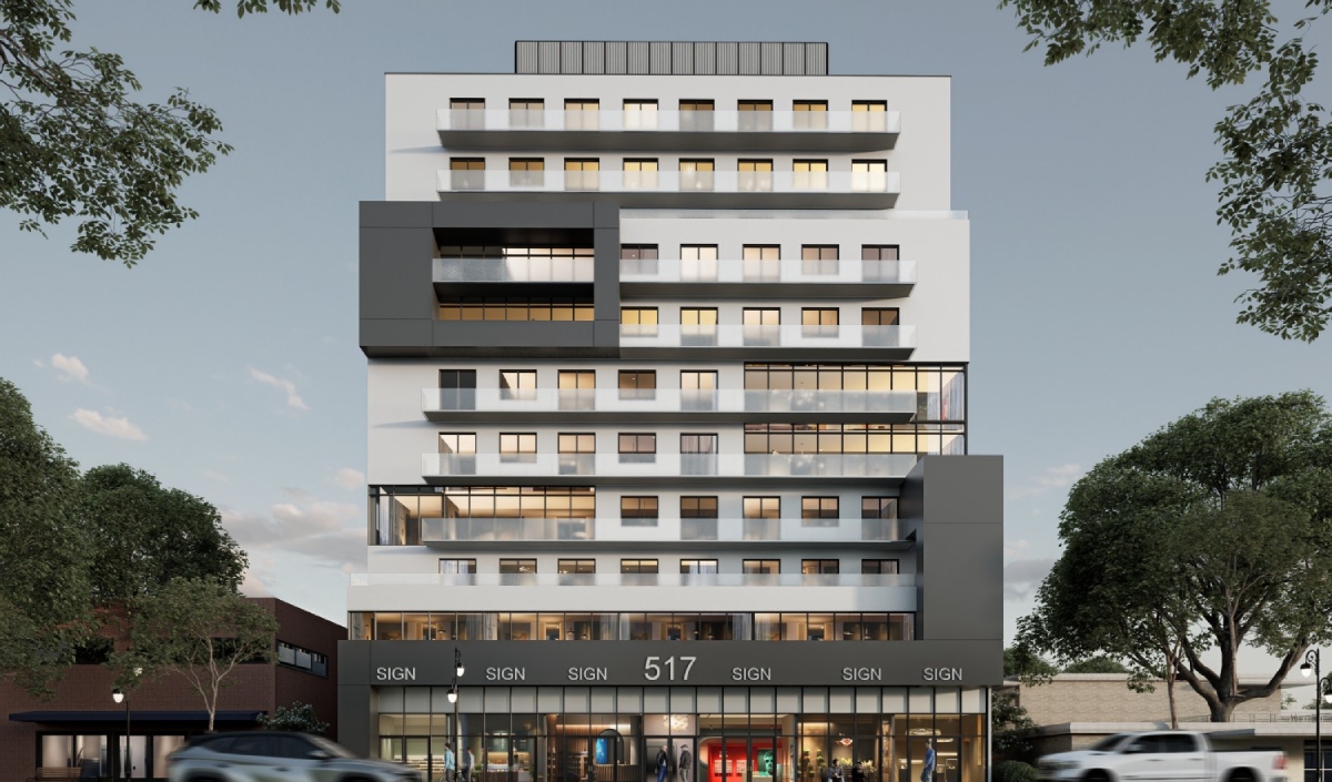 A modern mid-rise apartment building with balconies, large windows, and a ground-level storefront marked "517 SIGN"—now home to a New Dental Clinic in Oakville ON—surrounded by trees and moving cars.