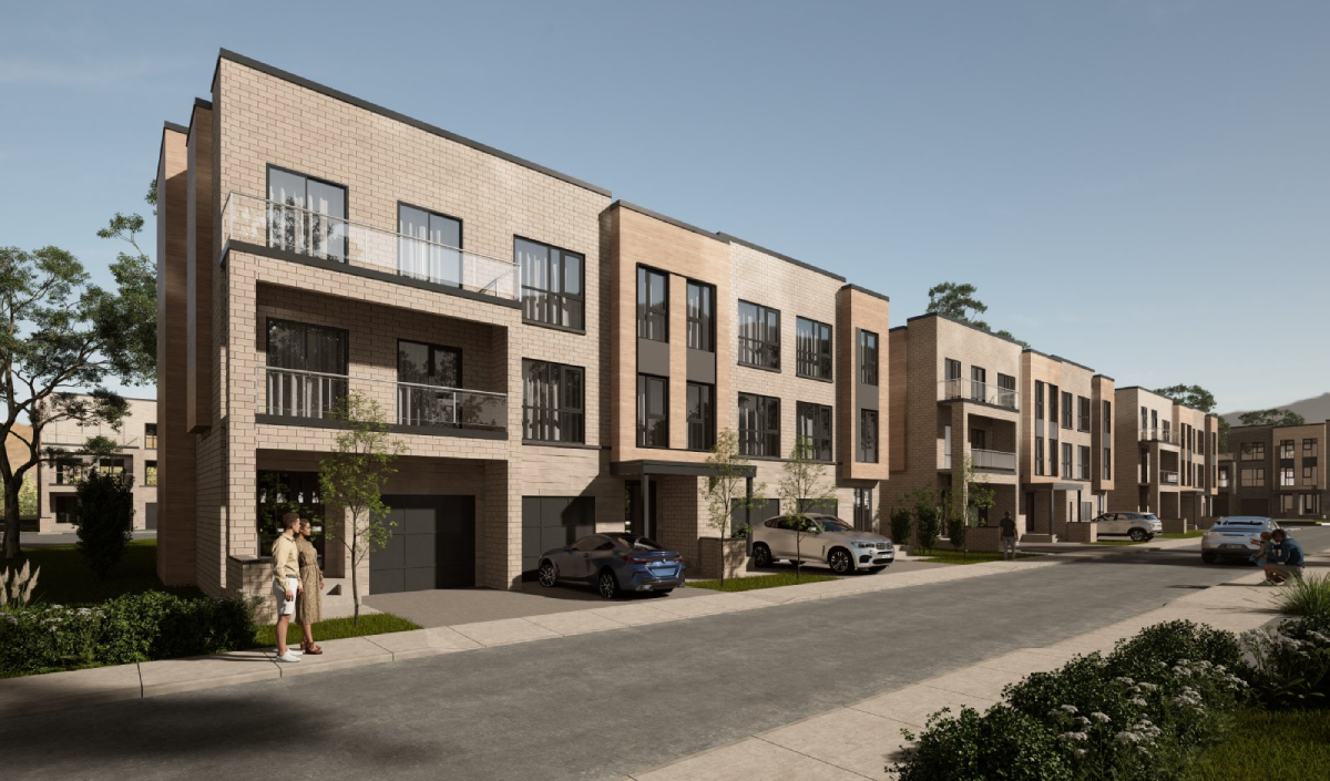 Modern three-story townhouses with large windows and attached garages line a residential street; parked cars and a couple walking are visible.