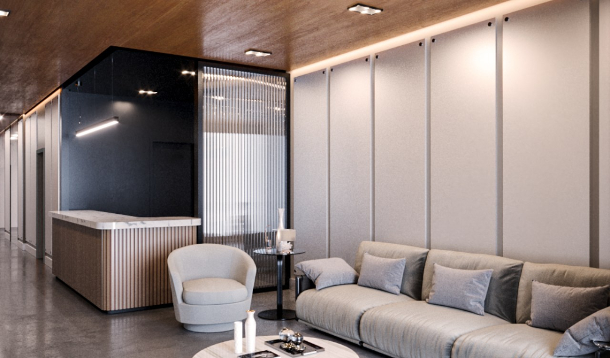 Modern lounge area with a gray sofa, armchair, coffee table, and a minimalist reception desk along a wall with vertical panels and wood ceiling.