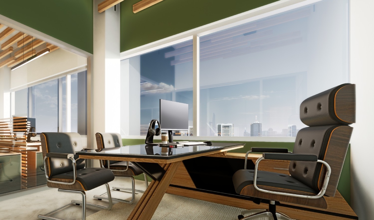 Modern office with large windows, a wooden desk, a computer monitor, leather chairs, and a view of city buildings outside.