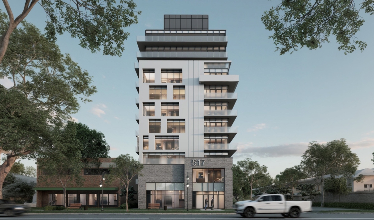 A modern mid-rise apartment building with large windows and balconies, featuring the stunning Burlington condo design by Lima Architects, stands along a tree-lined street with "517" at the entrance and a white pickup truck in front.